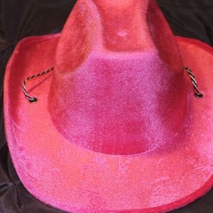 A unisex cowboy hat, hot pink.